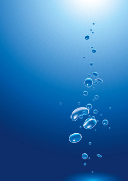 Bubbles coming up from the bottom of the dark deep cold ocean