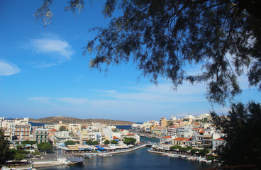 Sea city. Small Houses and Boats along the pier. Town on sea. Front view.