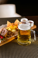 close-up beer mug on the table