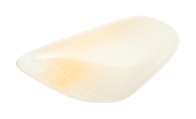 polished yellow Moonstone gem isolated on white