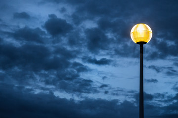 Beautiful street lamp of the famous planks. Deauville, Normandy, France. Beautiful colors, sky &...