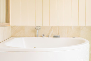 White bathtub and jacuzzi decoration interior