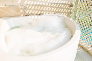 White bathtub and jacuzzi decoration interior