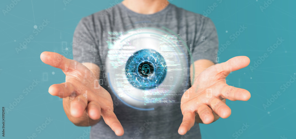 Poster businessman holding a visual recognition eye concept with data - 3d rendering