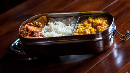 Indian tiffin, the lunch box with basic dal, rice and sabzi