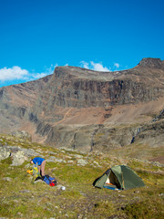 Woman at the campsite in the wilderness of swedish lapland