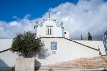 Fototapeta premium Albuferia, Portugal -The historical Igreja Santana church in the old town area of the Algarve region village
