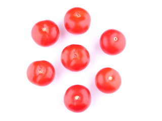 red tomatoes on a white background