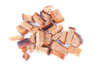 pieces of dried bread on a white background