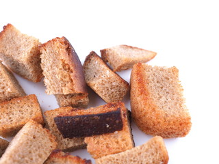 pieces of dried bread on a white background
