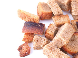 pieces of dried bread on a white background