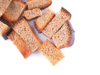 pieces of dried bread on a white background