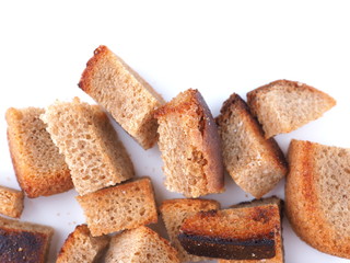 pieces of dried bread on a white background