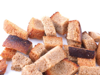 pieces of dried bread on a white background