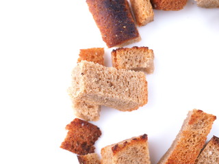 pieces of dried bread on a white background
