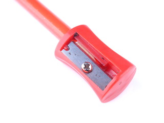 red pencil sharpener on a white background