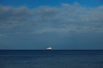 Ship on the horizon of a baltic sea
