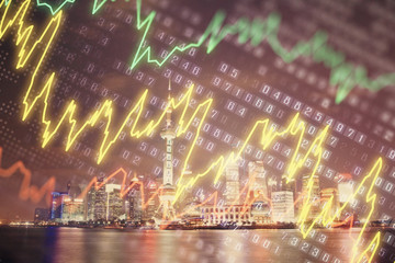 Financial graph on night city scape with tall buildings background multi exposure. Analysis concept.