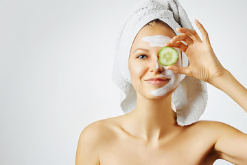 Cosmetology, skin care, face treatment, spa and natural beauty concept. Woman with facial mask...