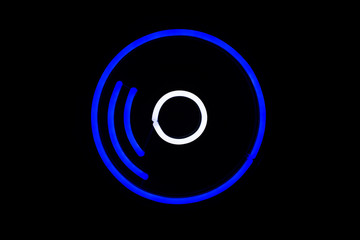 Blue vinyl record sign on isolated black background. Neon concept. Modern style. Neon sign. Flat lay, copy space, top view. 