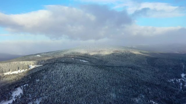 Pine forest, snow, mountains, blue sky, clouds, aerial photography