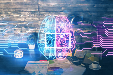 Multi exposure of work space with computer and human brain hologram. Brainstorm concept.