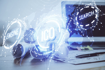 Double exposure of blockchain and crypto economy theme hologram and table with computer background....
