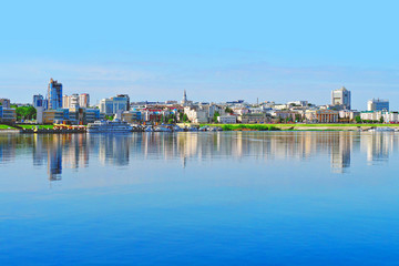 Cheboksary panoramic cityscape. Embankment, Cheboksary bay. View of the downtown city from the Volga river, reflection of the city in the water