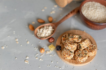 Raw vegan healthy dessert, date and nuts bliss balls, ingredients. Top view, space for text.