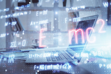 Desktop computer background and formula hologram writing. Double exposure. Education concept.