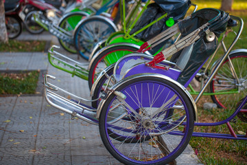 Fototapeta na wymiar The Old Quarter, The Hanoi Street, rickshaw in the streets of Vietnam
