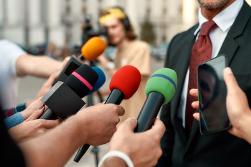 Journalists conducting interview of politician. Journalism industry, live streaming concept.