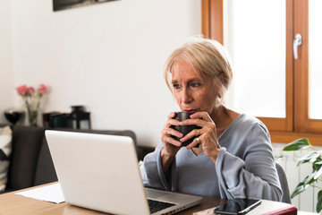 Adult woman drinking coffee