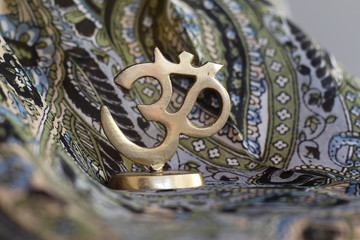 Figure of golden indian symbol aum.