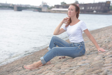 Fototapeta na wymiar woman in jeans and white t-shirt