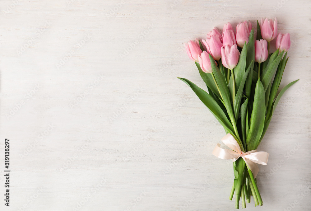 Canvas Prints Beautiful pink spring tulips on white wooden background, top view. Space for text