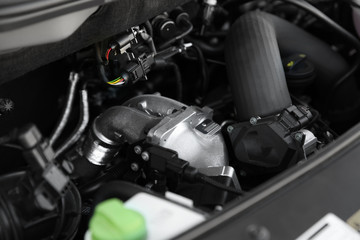 Fototapeta na wymiar Closeup view of engine bay in modern car
