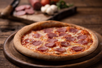 Pepperoni Pizza on wooden table