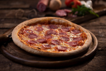 Pepperoni Pizza on wooden table