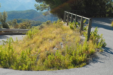 Fototapeta premium road curve in mountain, on a sunny day