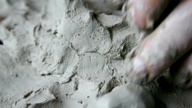 Sculptor Working With Clay