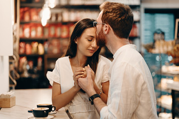 Loving couple in a coffee shop