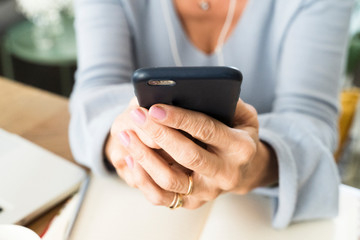 closeup of a woman using mobile phone