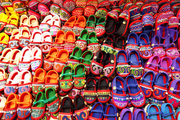 Full Color of handicraft Baby shoes from the Pattaya Floating Market,Thailand. Selective focus