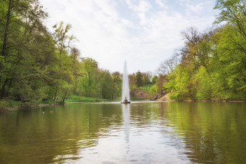 Spring scenery. Pond Ionian Sea and the fountain Snake in the National Dendrological Park Sofiyivka, Uman, Ukraine