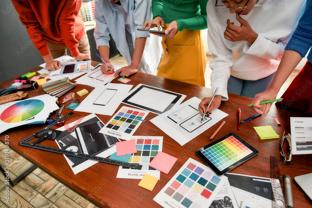 Poster responsive web design. cropped photo of creative people prototyping new web site design for a client
