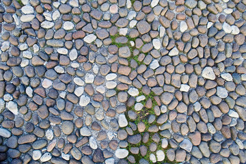 Pavement pebble pathway pattern texture background, the part of italian old style stone sidewalk