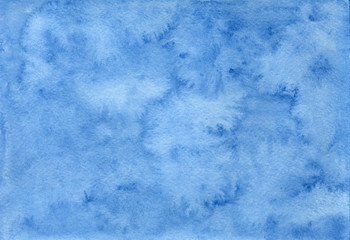 Beautiful blue abstract hand drawn background with watercolor blurry spots resembling sea waves or sky