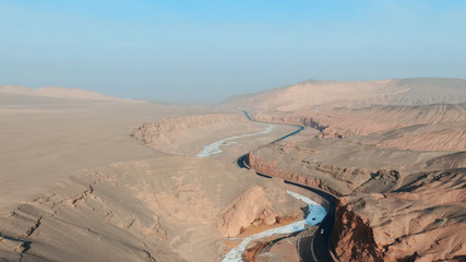 Aerial view of China Xinjiang Taklamakan Desert Aera Canyon in winter season.