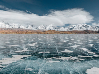 Aerial view of China Xinjiang Kashgar Karakuri Lake in winter season. Drone Shot Photo.